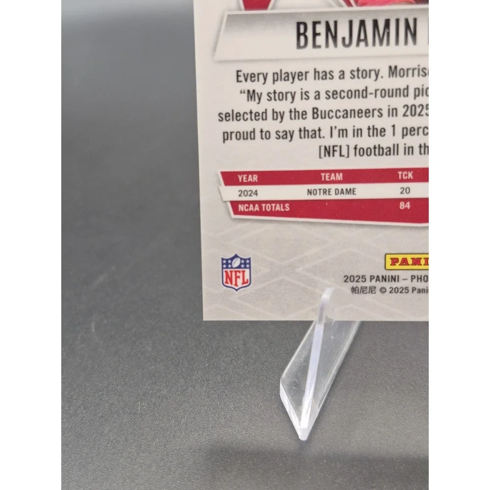 2025 Panini Phoenix Benjamin Morrison #247 Rookie Ash Mojo /25 (RC) Buccaneers